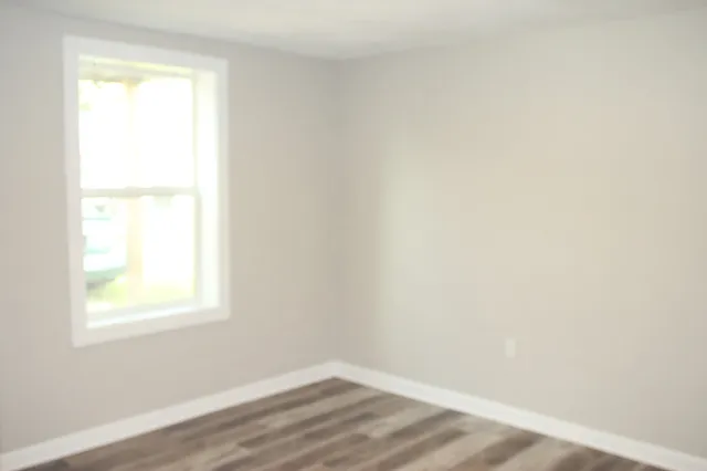 an empty room with a window