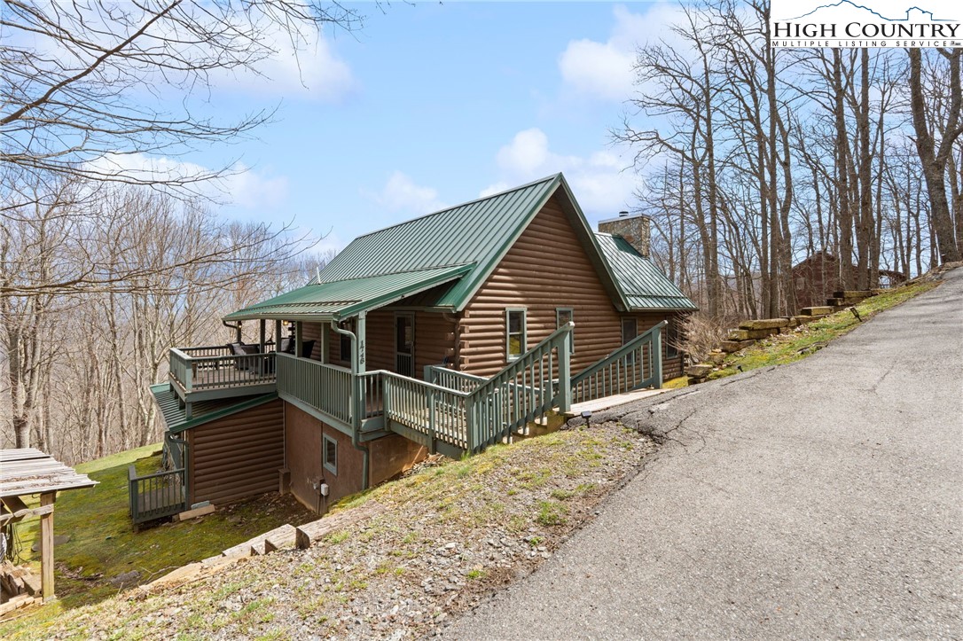 1748 Junaluska Road Boone, NC 28607 - Photo 3 of 37 a view of house with a outdoor space