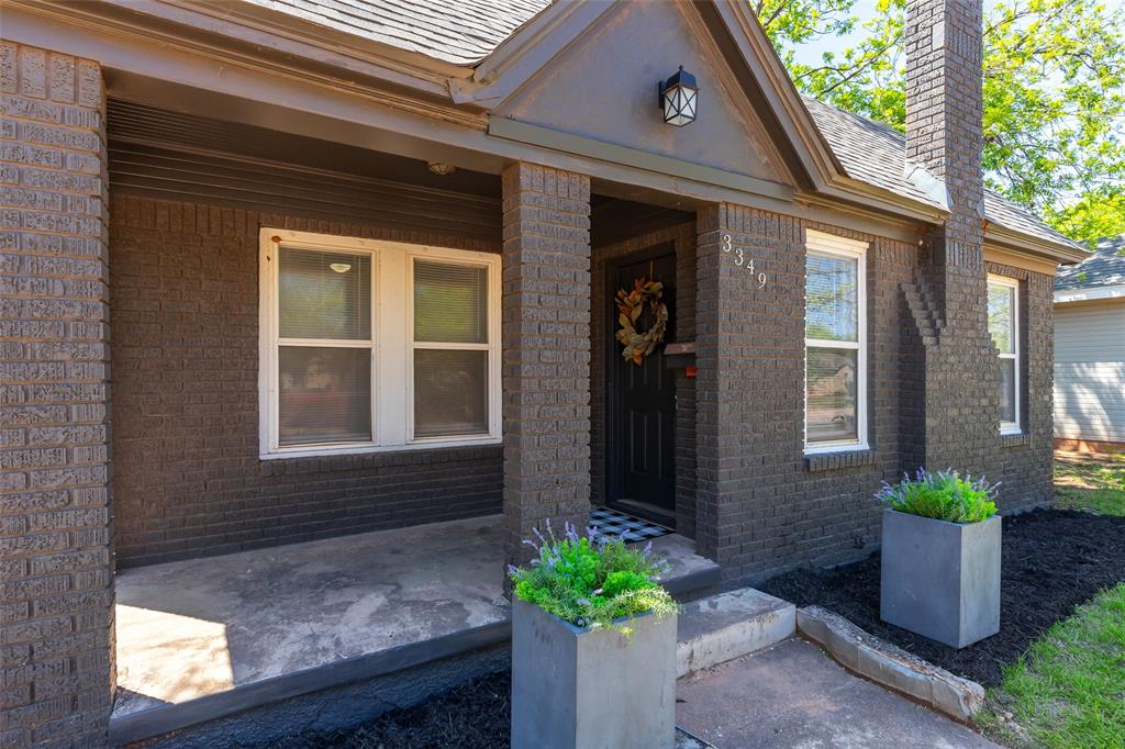 3349 South 3rd Street Abilene, TX 79605 - Photo 1 of 30 a front view of a house with a yard