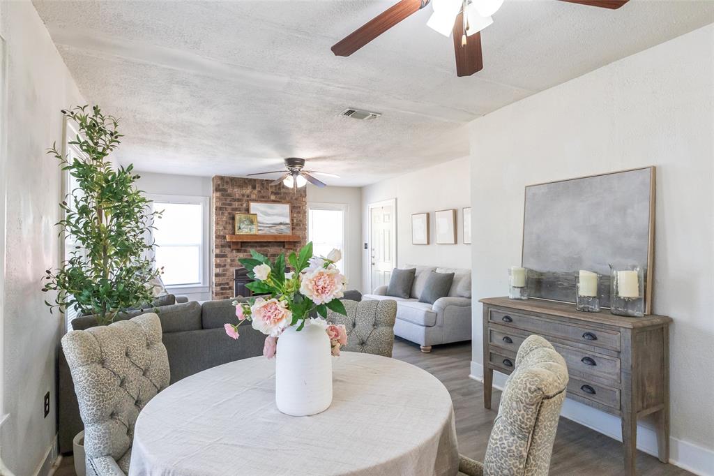 3349 South 3rd Street Abilene, TX 79605 - Photo 12 of 30 a dining room with furniture a livingroom and chandelier
