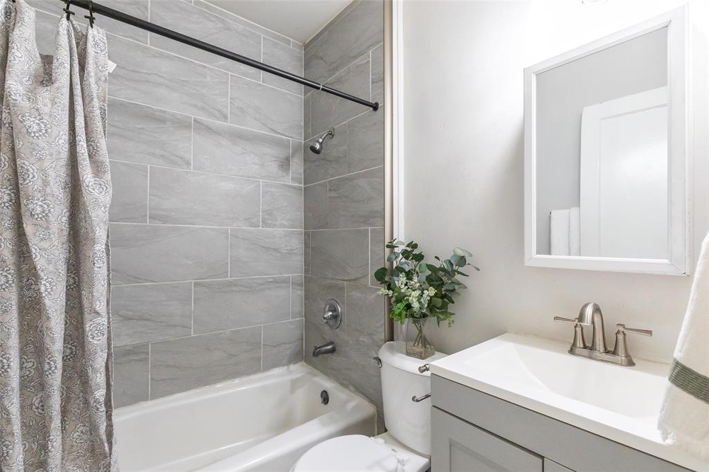 3349 South 3rd Street Abilene, TX 79605 - Photo 20 of 30 a bathroom with a sink toilet and shower