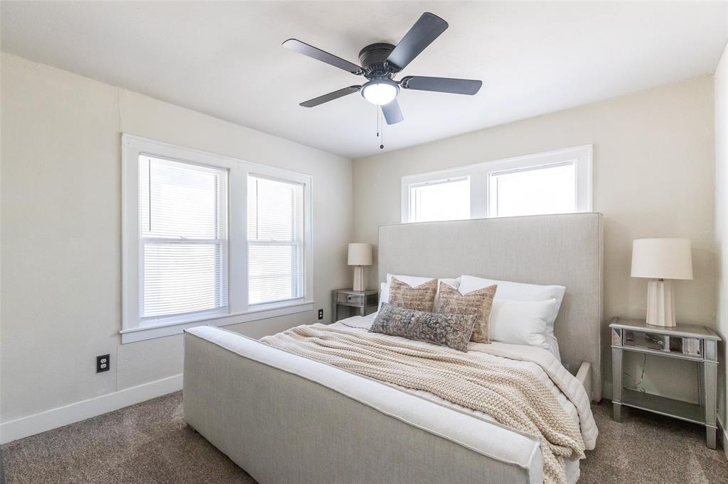 3349 South 3rd Street Abilene, TX 79605 - Photo 21 of 30 a bedroom with a large bed and a large window