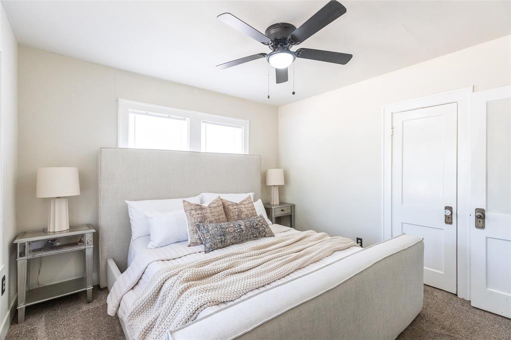 3349 South 3rd Street Abilene, TX 79605 - Photo 22 of 30 a bedroom with a bed and a lamp