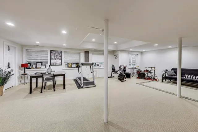 a front view of a house with a patio