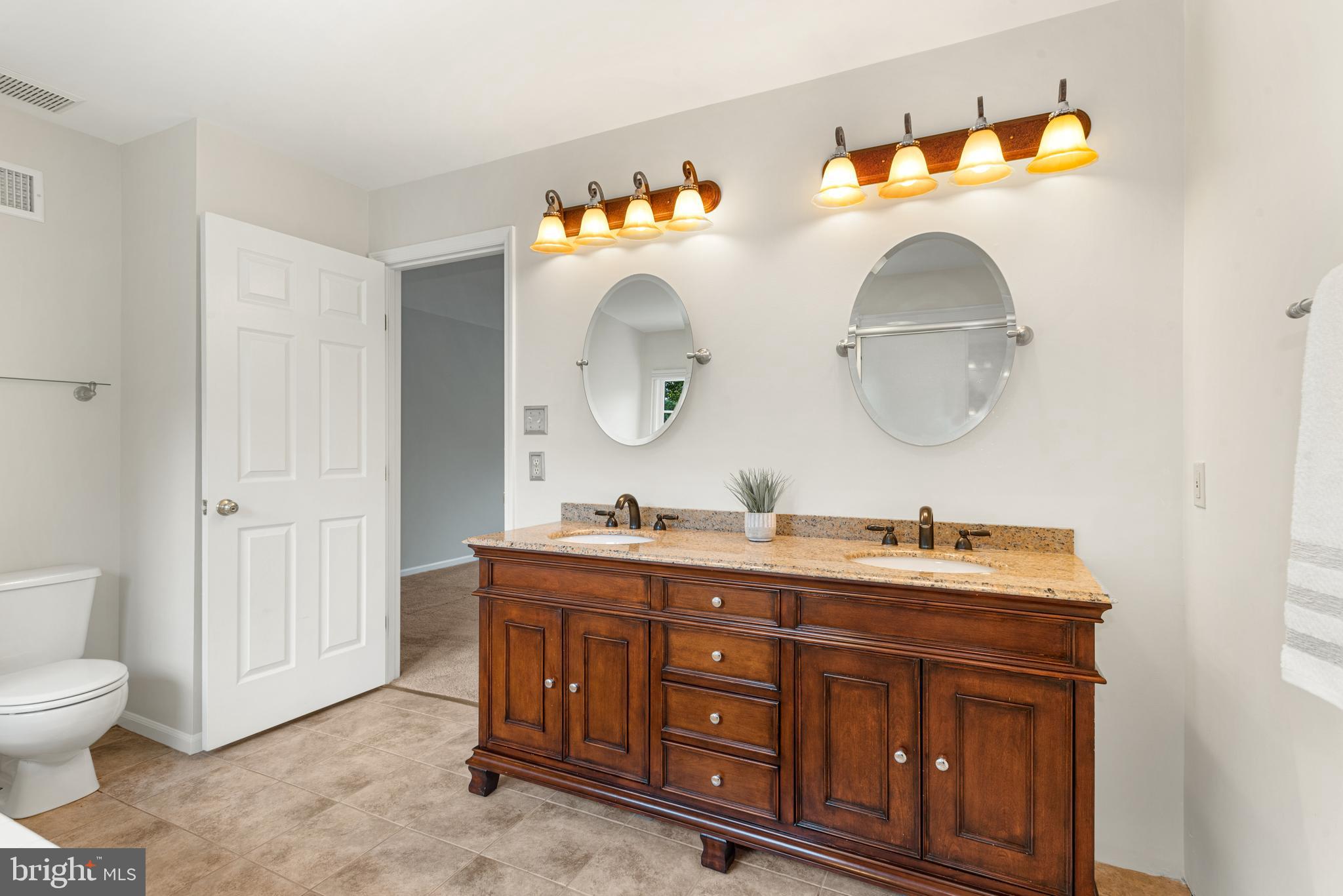 12701 Thunder Chase Drive Reston, VA 20191 - Photo 27 of 44 dual vanities in primary bath