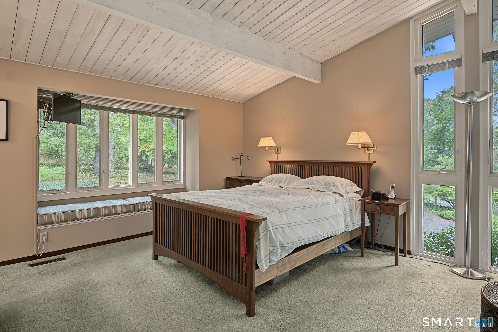 24 Mallard Point Road Essex, CT 06426 - Photo 17 of 30 Primary bedroom with lots of light and ensuite.