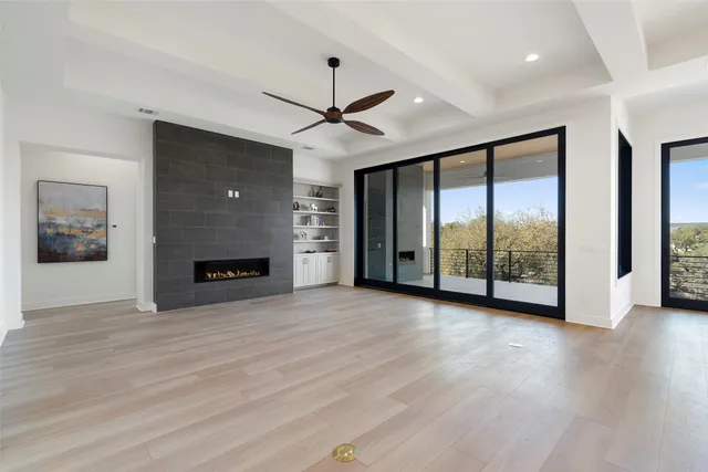 a spacious bathroom with double sink large mirror and a