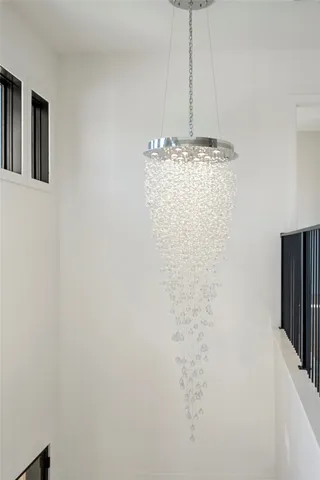 a large kitchen with stainless steel appliances lots of counter space and wooden floor