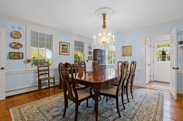 a kitchen with a sink stove top oven and cabinets