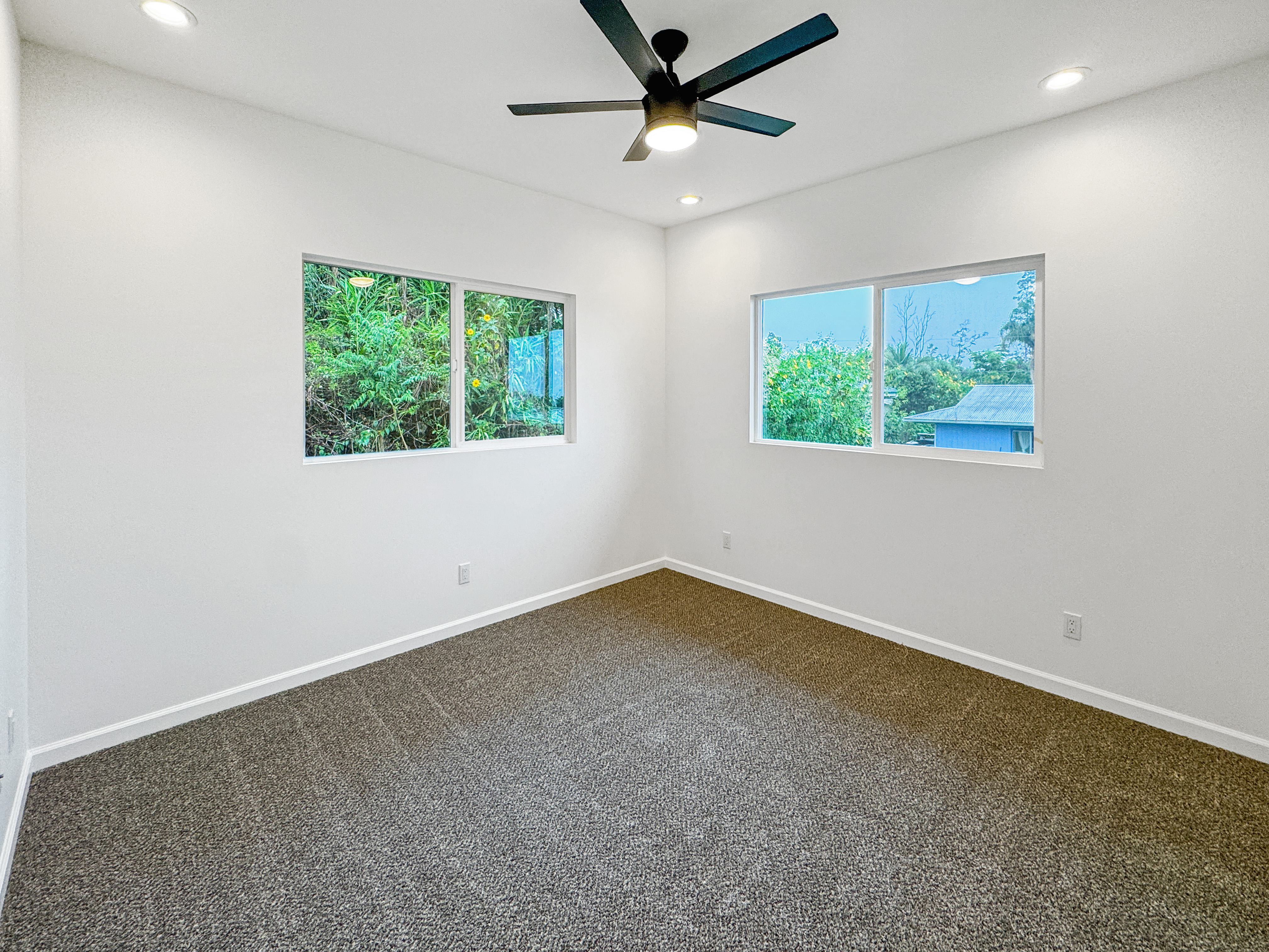 18-7846 Leonaka Road Mountain View, HI 96771 - Photo 9 of 13 a view of an empty room with a window