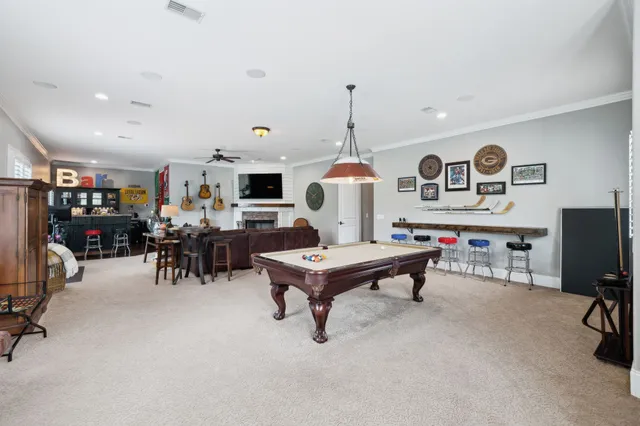 a kitchen with stainless steel appliances granite countertop a stove and cabinets