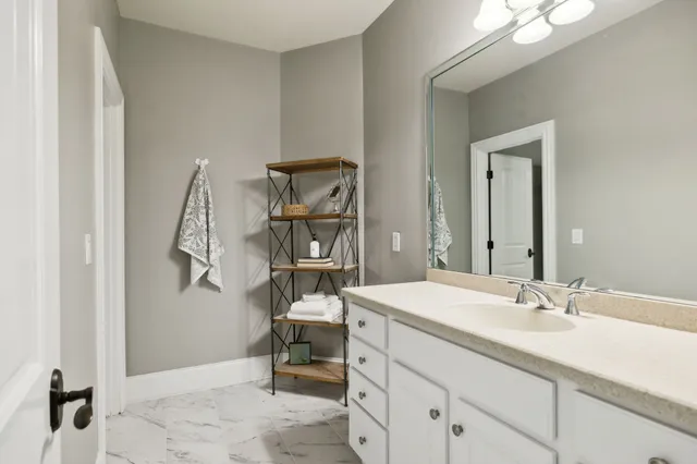 a view of a house with backyard sitting area and garden