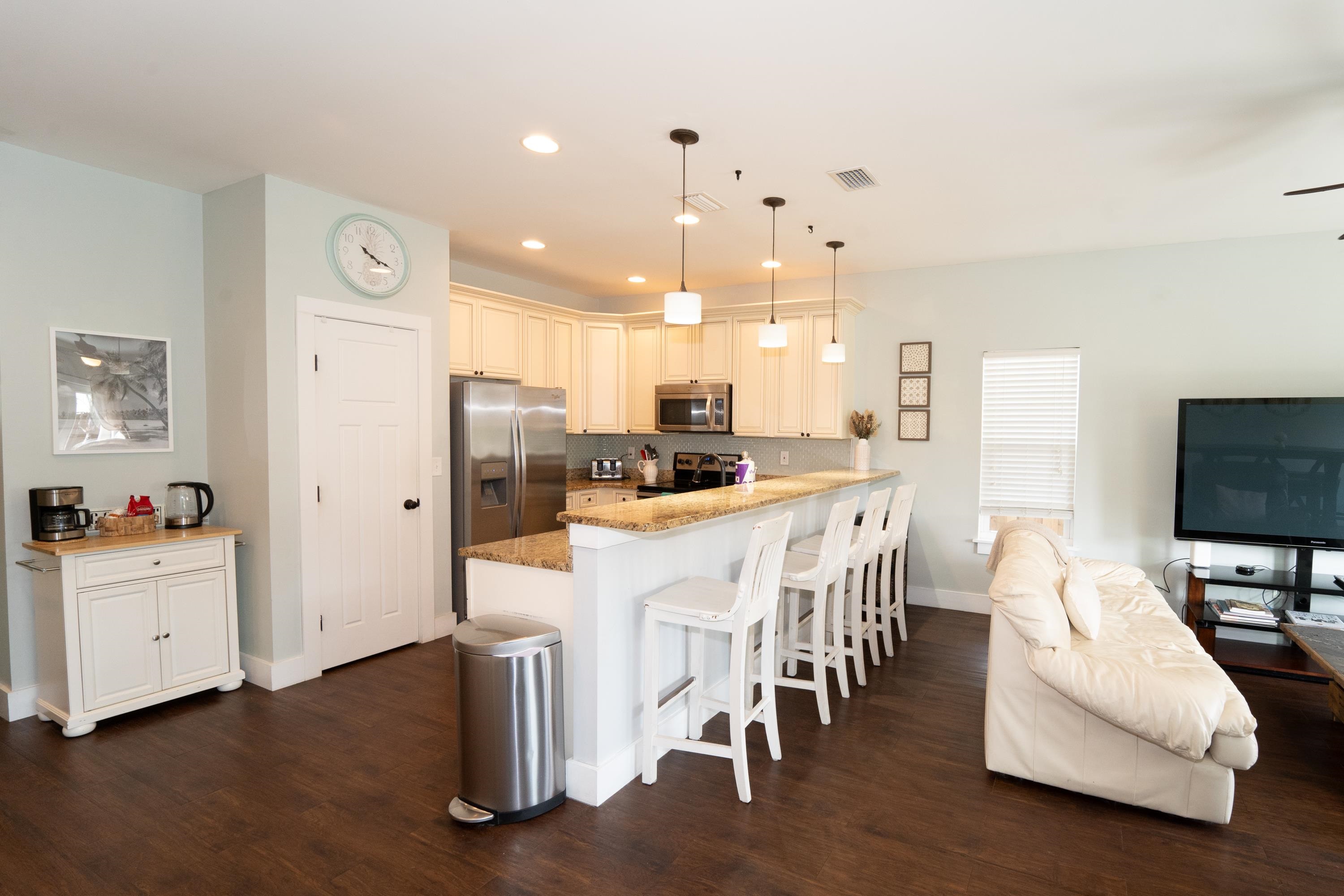 228 Herada Street St. Augustine, FL 32080 - Photo 7 of 32 a dining room with furniture and a flat screen tv