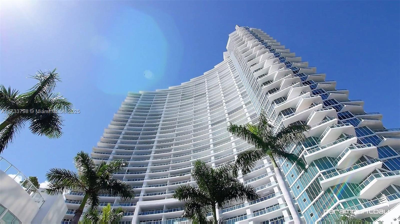 2020 North Bayshore Drive, Unit 2302 Miami, FL 33137 - Photo 57 of 57 a view of a tall building with a yard