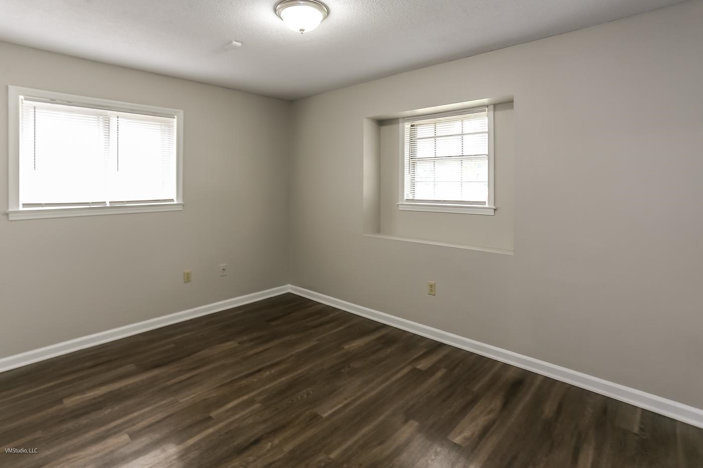 5217 Yale Road Memphis, TN 38134 - Photo 22 of 30 Unfurnished room featuring dark hardwood / wood-style flooring