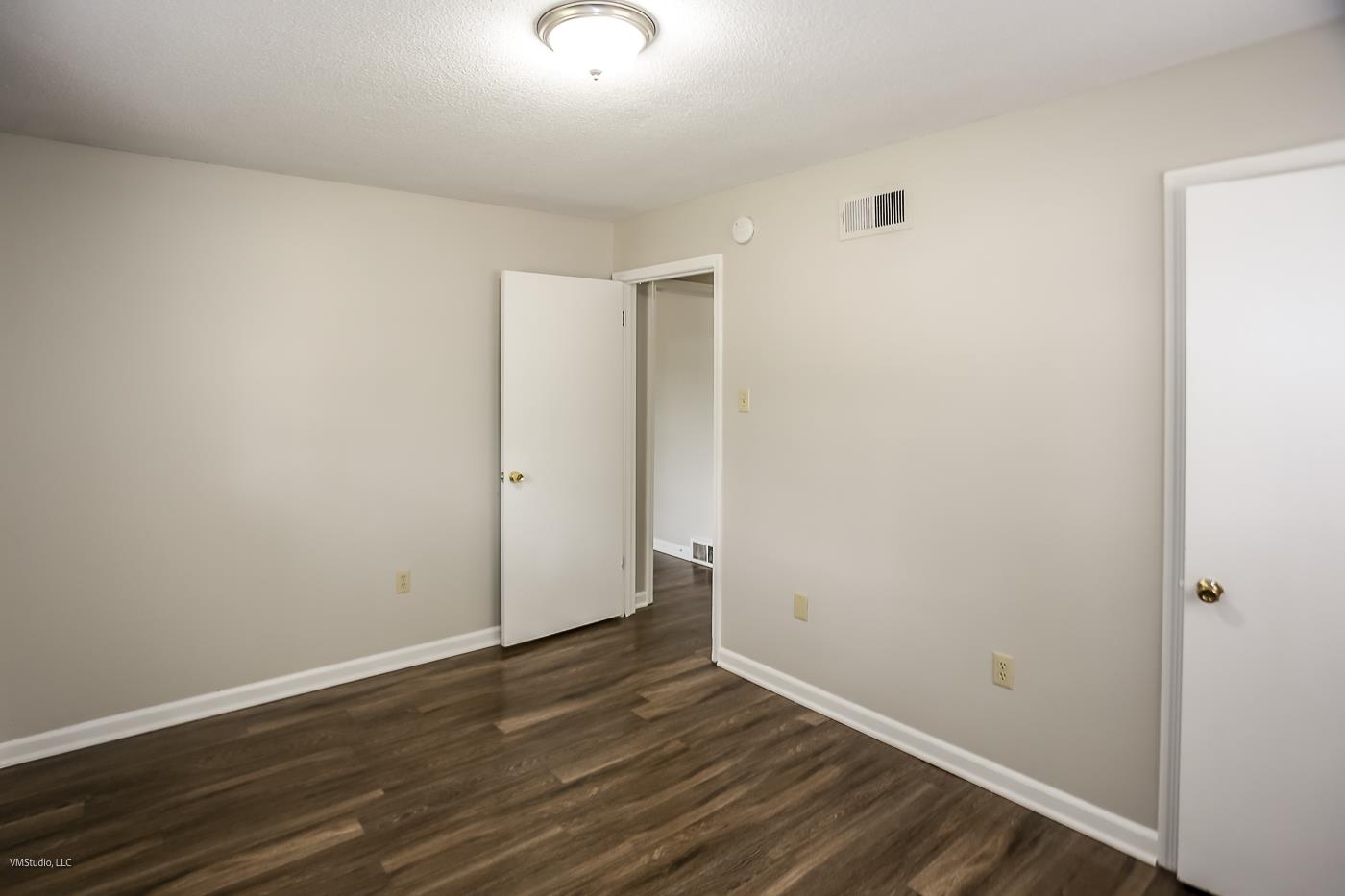 5217 Yale Road Memphis, TN 38134 - Photo 23 of 30 Unfurnished room featuring dark wood-type flooring