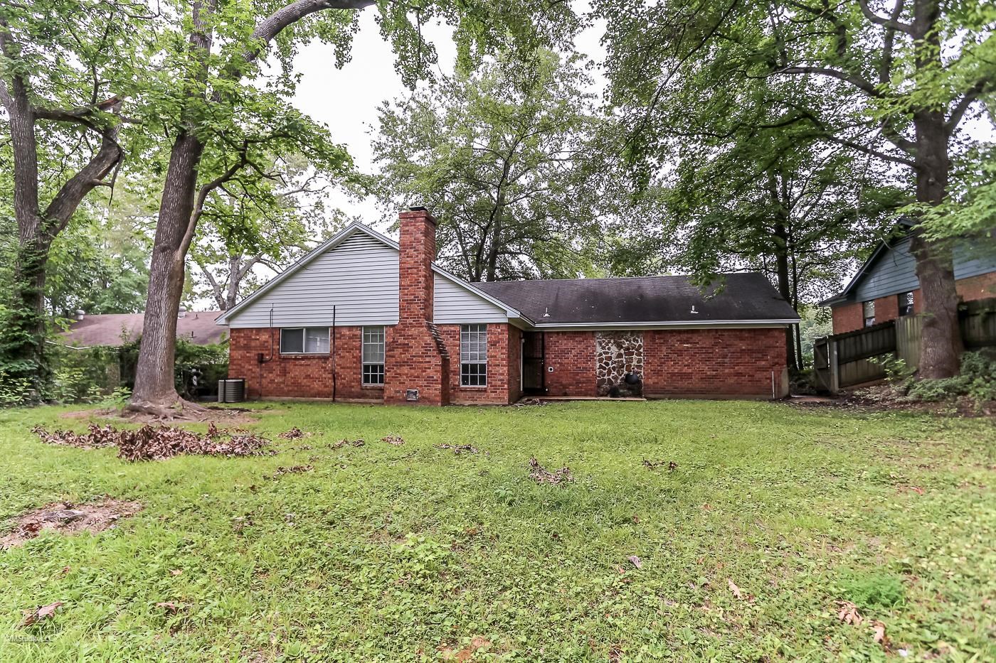 5217 Yale Road Memphis, TN 38134 - Photo 27 of 30 Exterior space featuring central AC unit and a yard