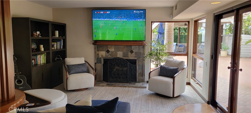 34283 Via Lopez Dana Point, CA 92624 - Photo 11 of 36 Spacious Family Room with 75" Smart TV, Fireplace, Queen Sleeper, French Doors