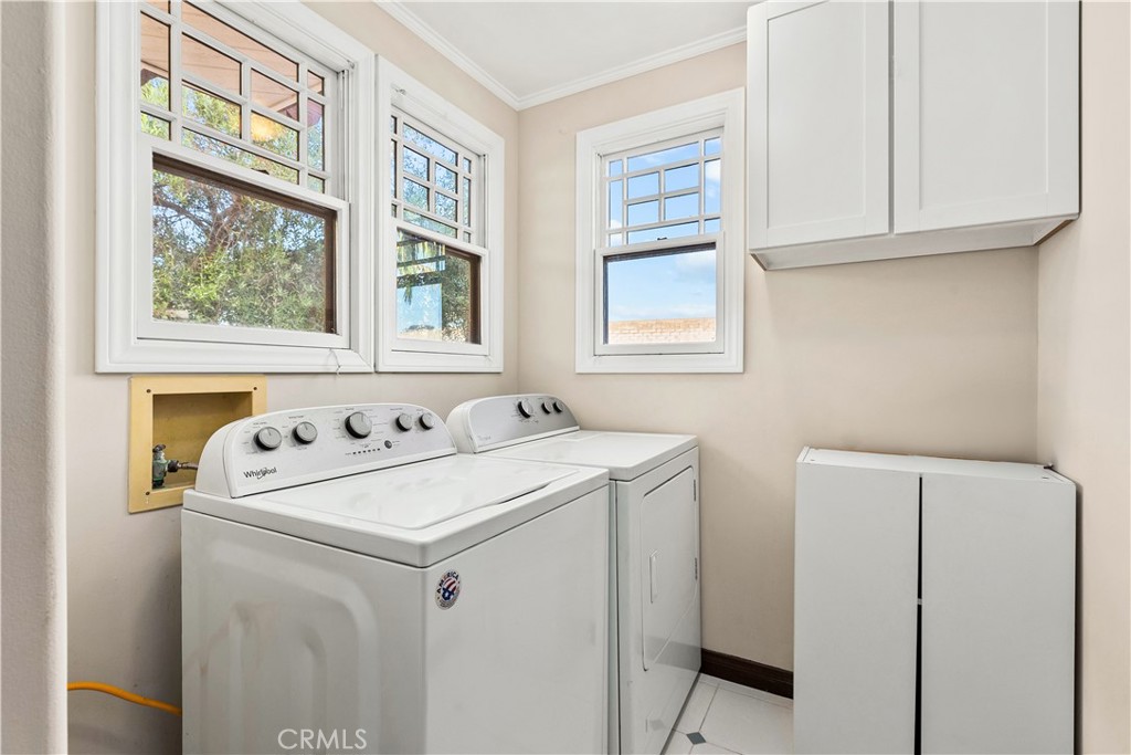 34283 Via Lopez Dana Point, CA 92624 - Photo 15 of 36 Separate Laundry Room with Large Capacity Washer and Dryer Plus Storage