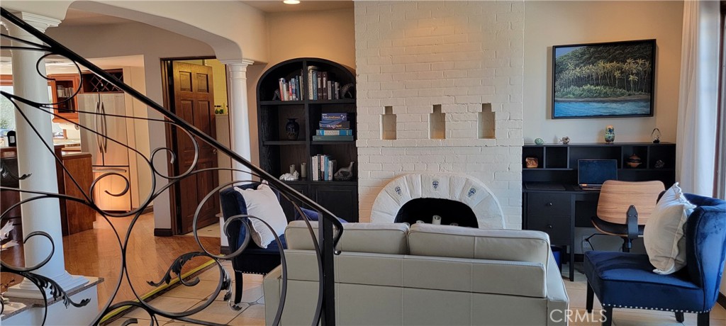 34283 Via Lopez Dana Point, CA 92624 - Photo 7 of 36 Brand New Furniture Throughout Home. Living Room Equipped with USB desk and library.