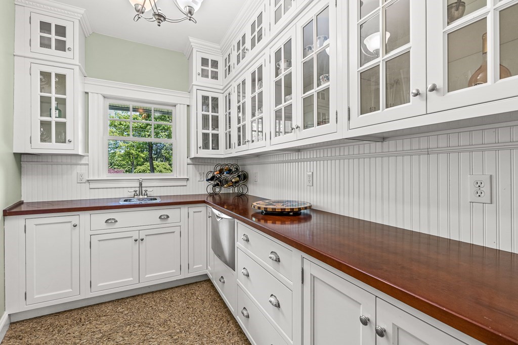 3 Ordway Road Wellesley, MA 02481 - Photo 14 of 38 a kitchen with stainless steel appliances cabinets and a window