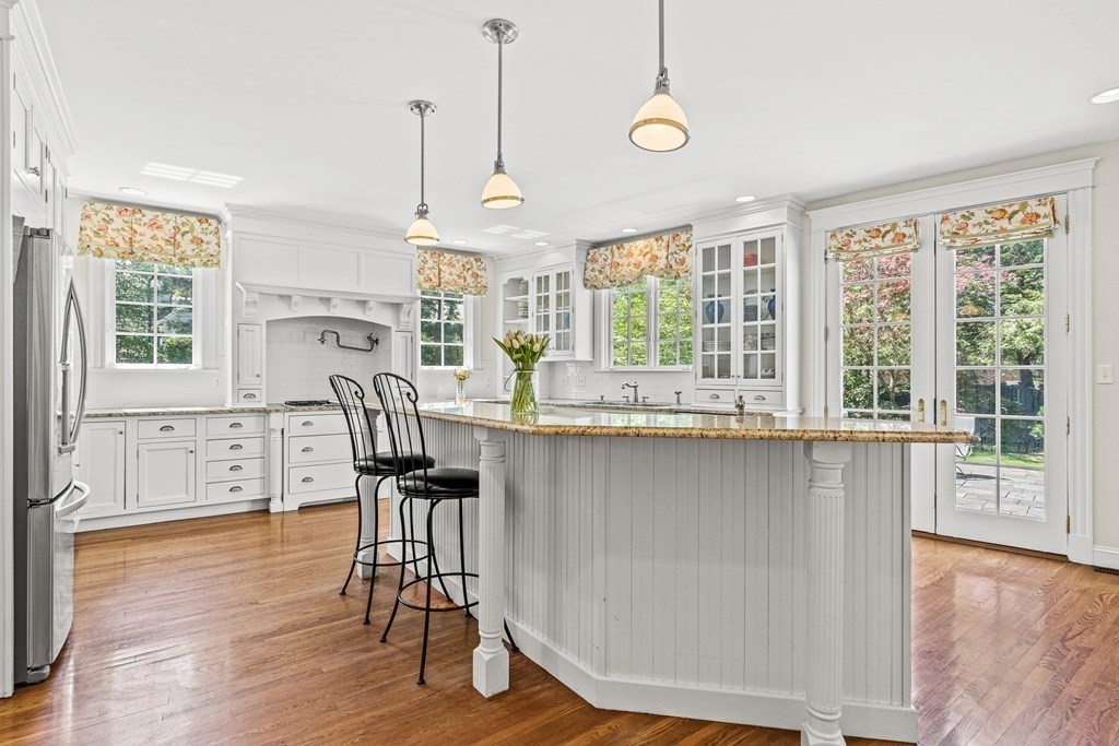 3 Ordway Road Wellesley, MA 02481 - Photo 19 of 38 a very nice looking kitchen with wooden floor and a window