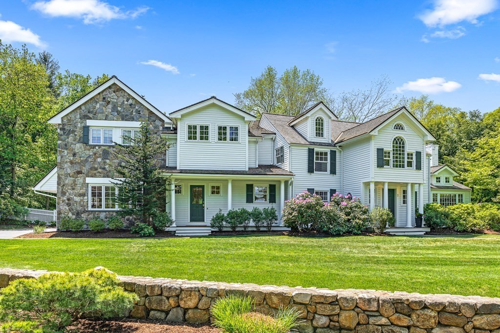 3 Ordway Road Wellesley, MA 02481 - Photo 2 of 38 a front view of a house with a yard
