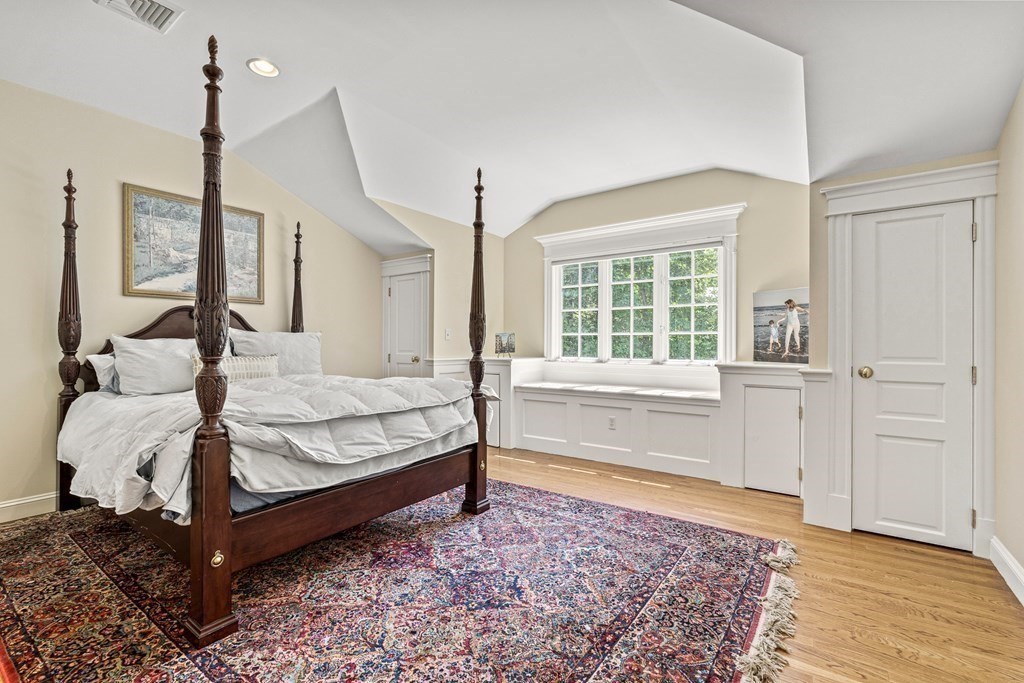 3 Ordway Road Wellesley, MA 02481 - Photo 32 of 38 a spacious bedroom with a large bed and a window