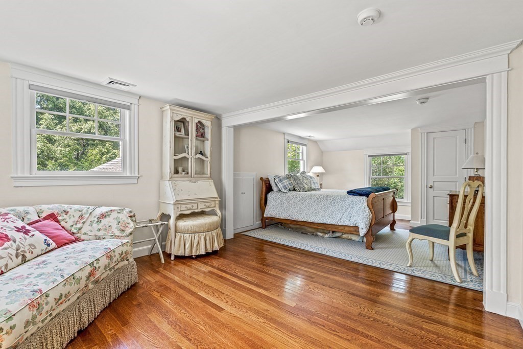3 Ordway Road Wellesley, MA 02481 - Photo 33 of 38 a bedroom with furniture and a wooden floor