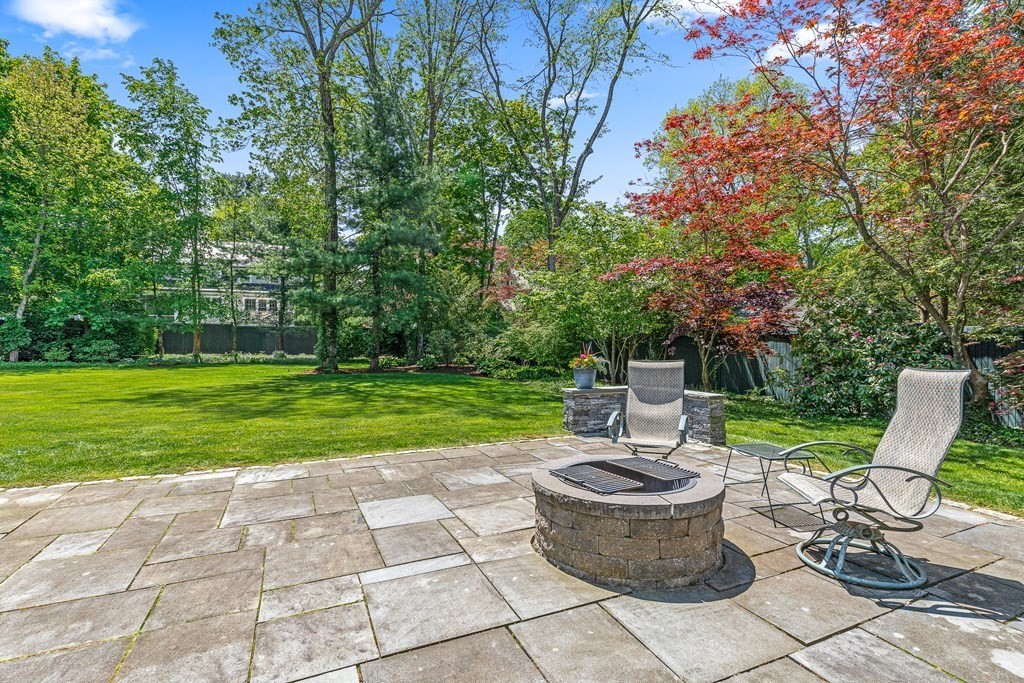 3 Ordway Road Wellesley, MA 02481 - Photo 8 of 38 a view of a backyard with sitting area and garden