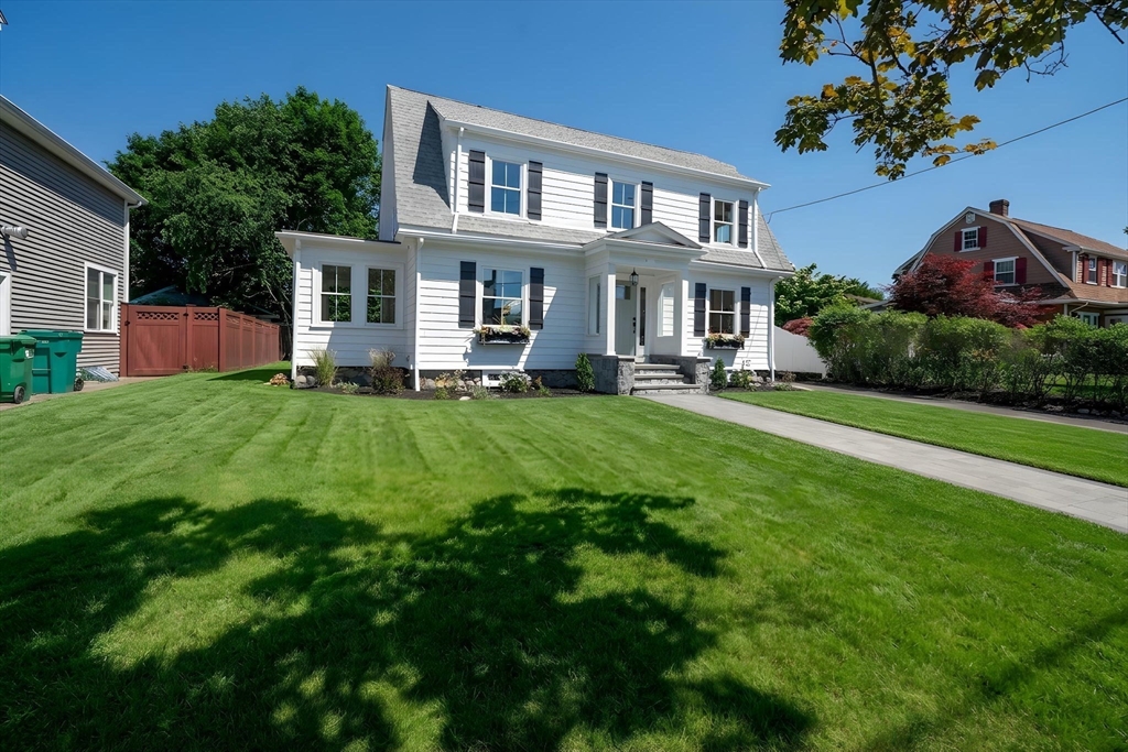 20 Saltonstall Road Medford, MA 02155 - Photo 2 of 41 a front view of a house with a garden