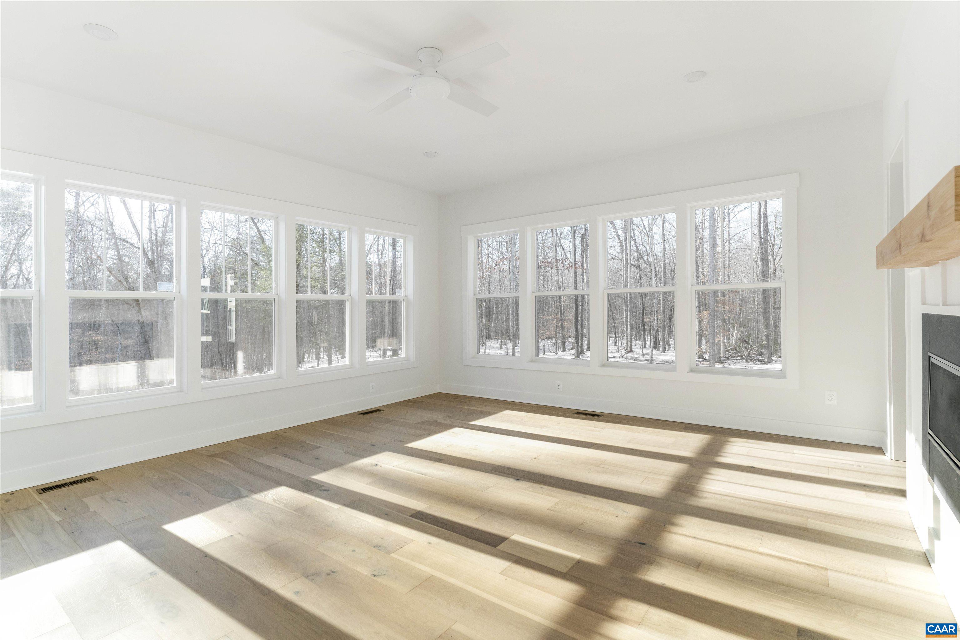 1000 Broad Axe Road Charlottesville, VA 22903 - Photo 26 of 58 a view of an empty room with wooden floor and a window