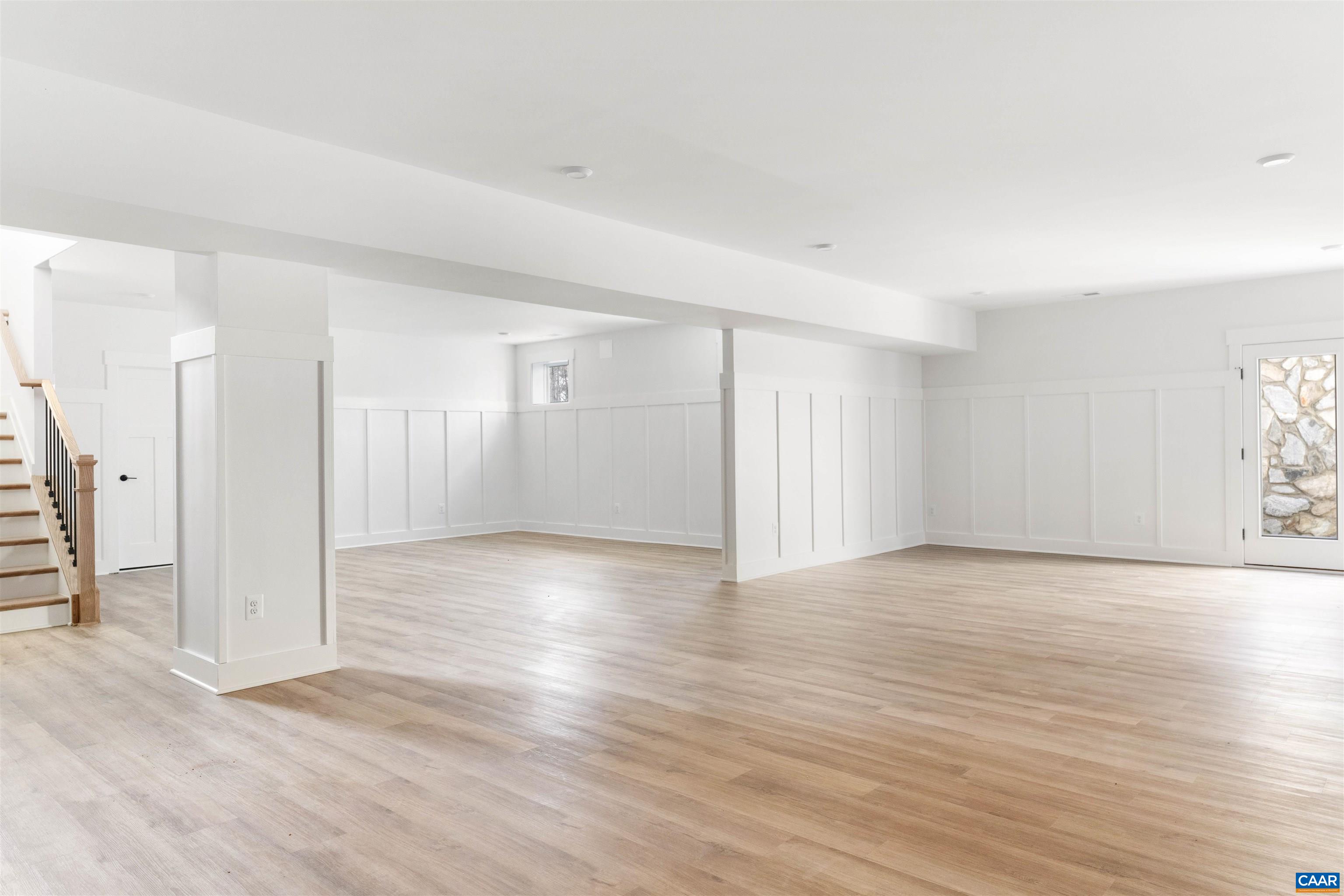 1000 Broad Axe Road Charlottesville, VA 22903 - Photo 44 of 58 a view of an empty room with wooden floor and a window