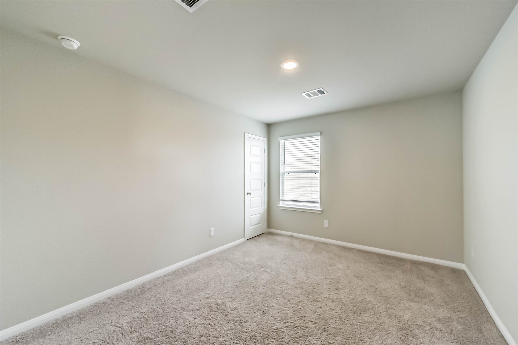 4907 Luke Matthew Drive Rosharon, TX 77583 - Photo 31 of 42 a view of an empty room with a window