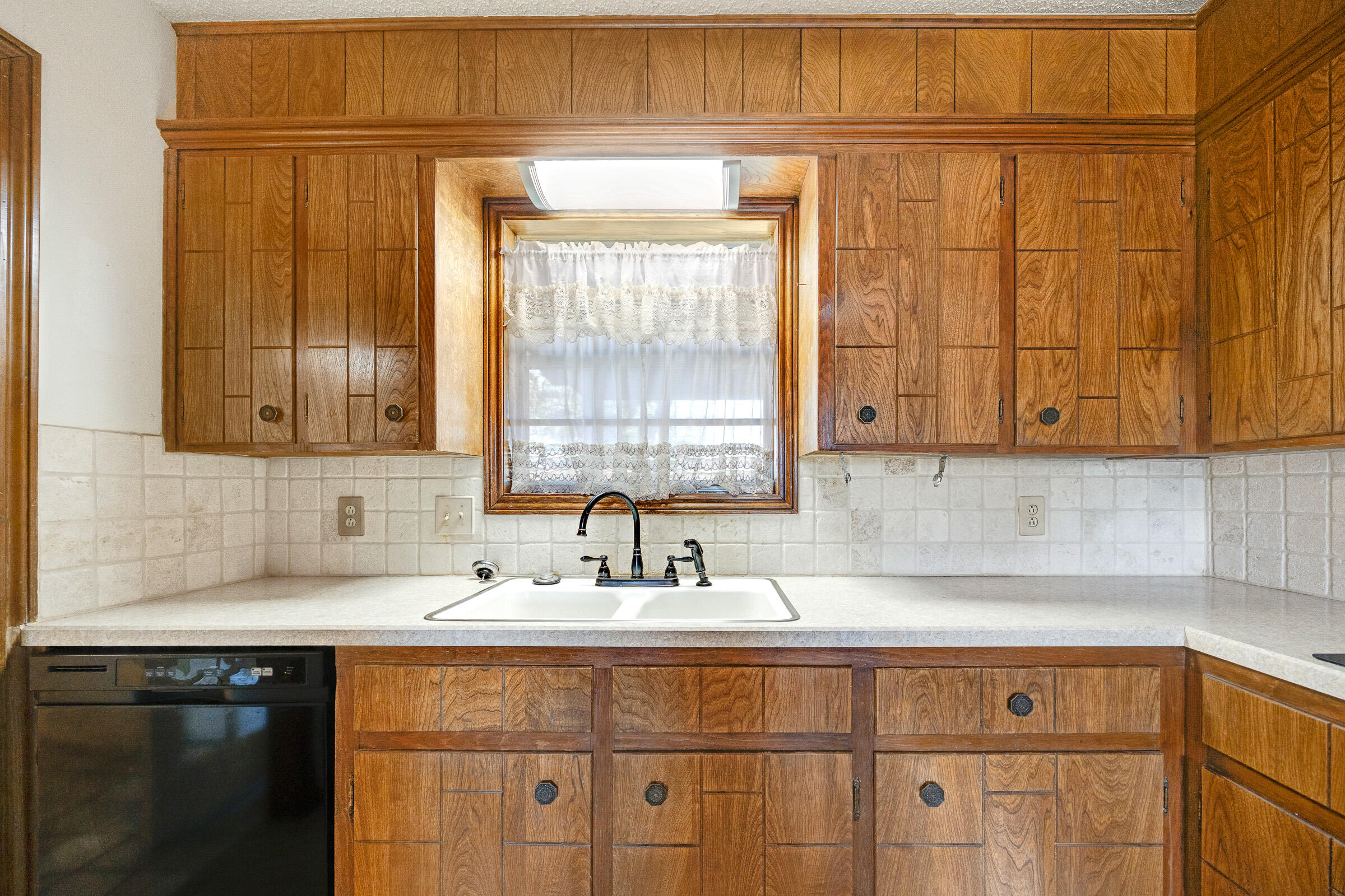 4416 62nd Street Lubbock, TX 79414 - Photo 12 of 70 a kitchen with stainless steel appliances granite countertop a sink and a cabinets