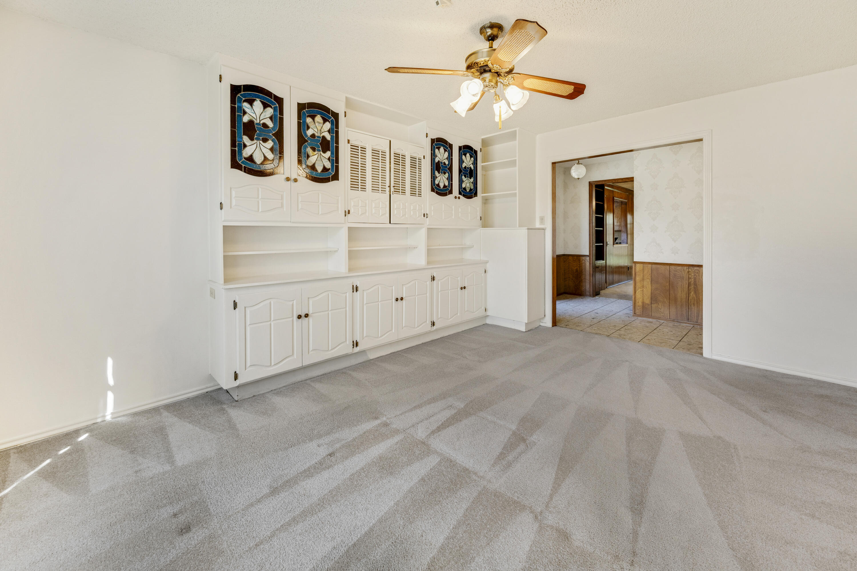 4416 62nd Street Lubbock, TX 79414 - Photo 18 of 70 a view of a bedroom with cabinet