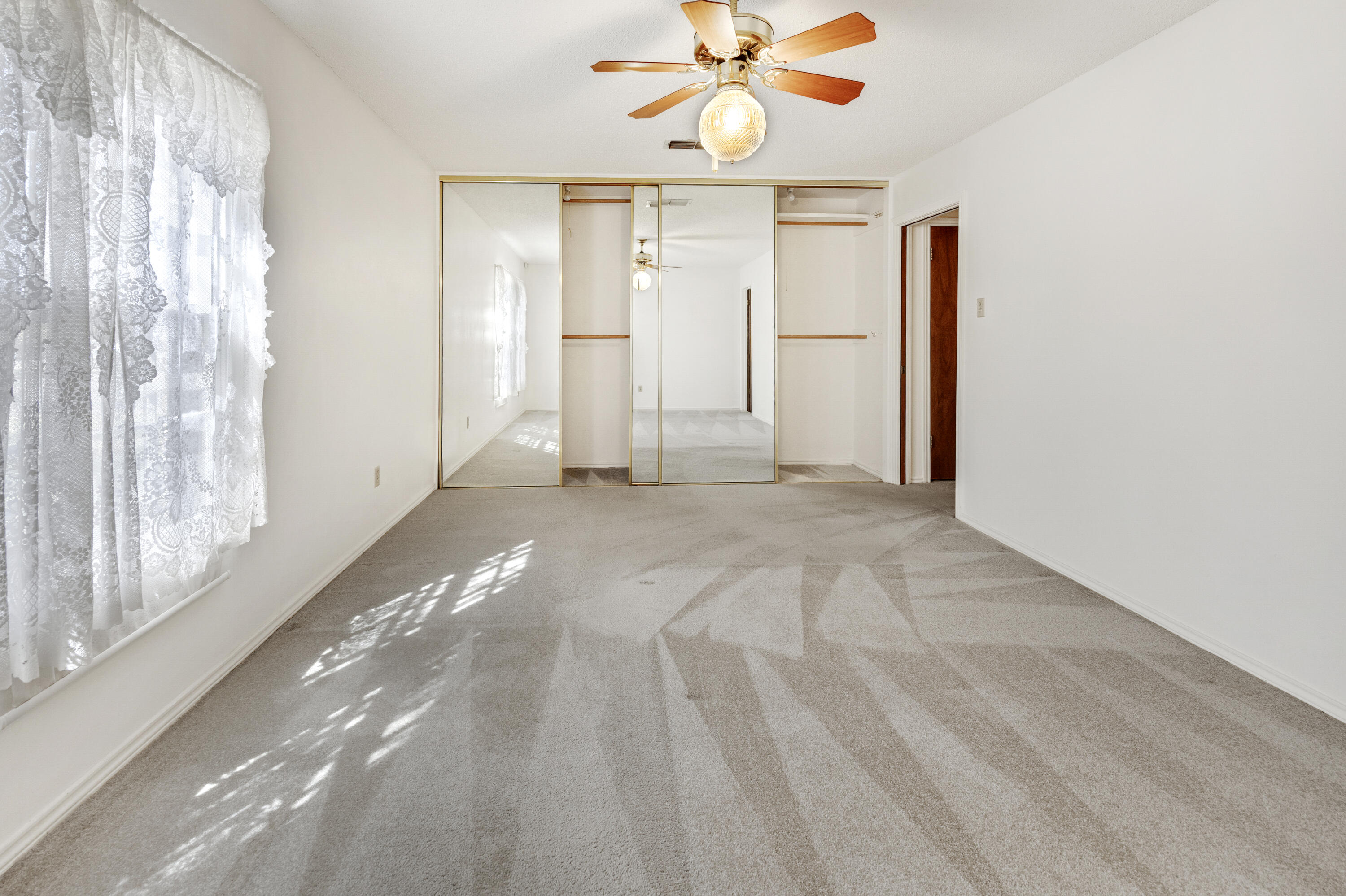 4416 62nd Street Lubbock, TX 79414 - Photo 26 of 70 a view of an empty room with a window