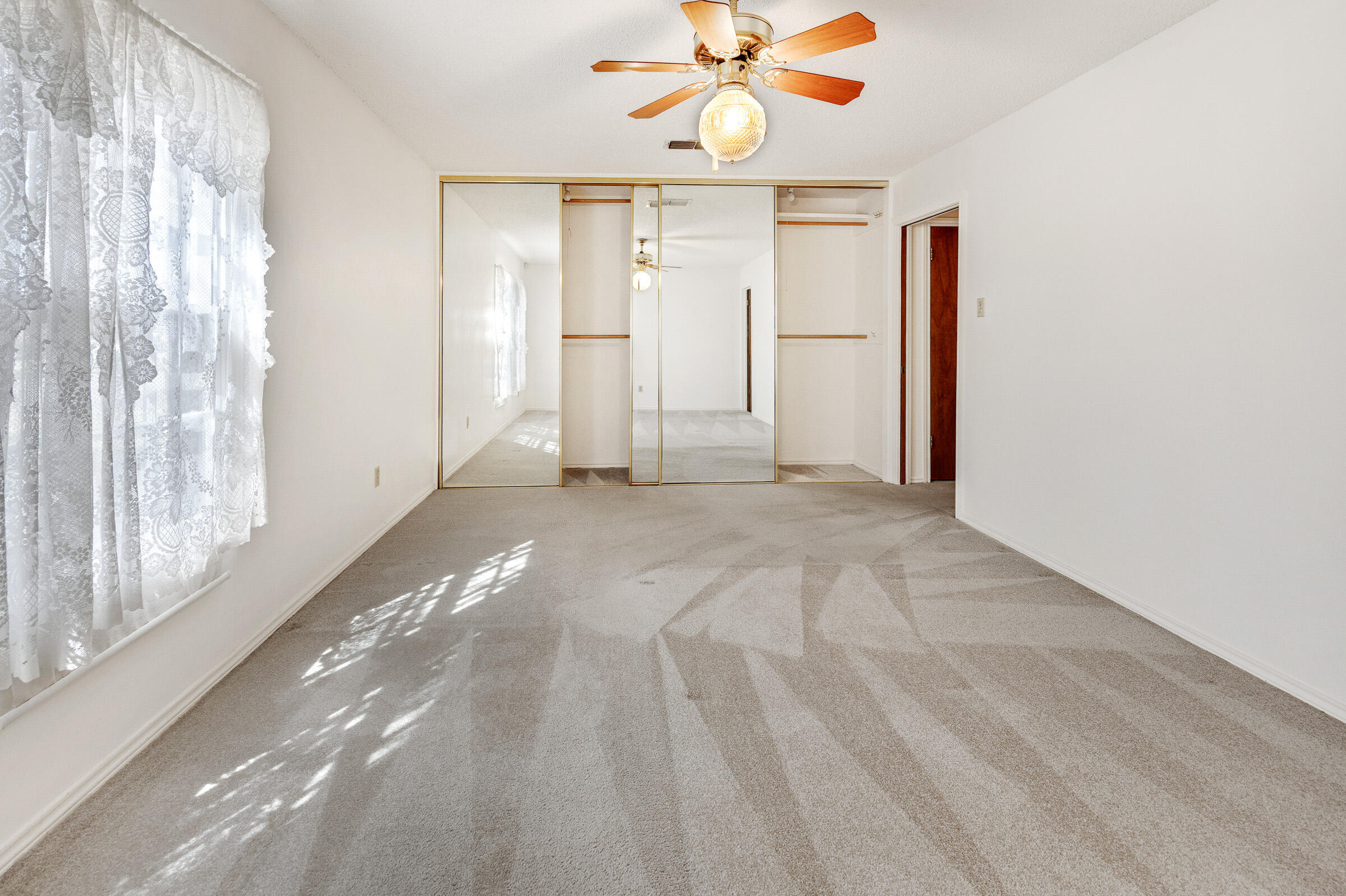 4416 62nd Street Lubbock, TX 79414 - Photo 44 of 70 a view of an empty room with a window