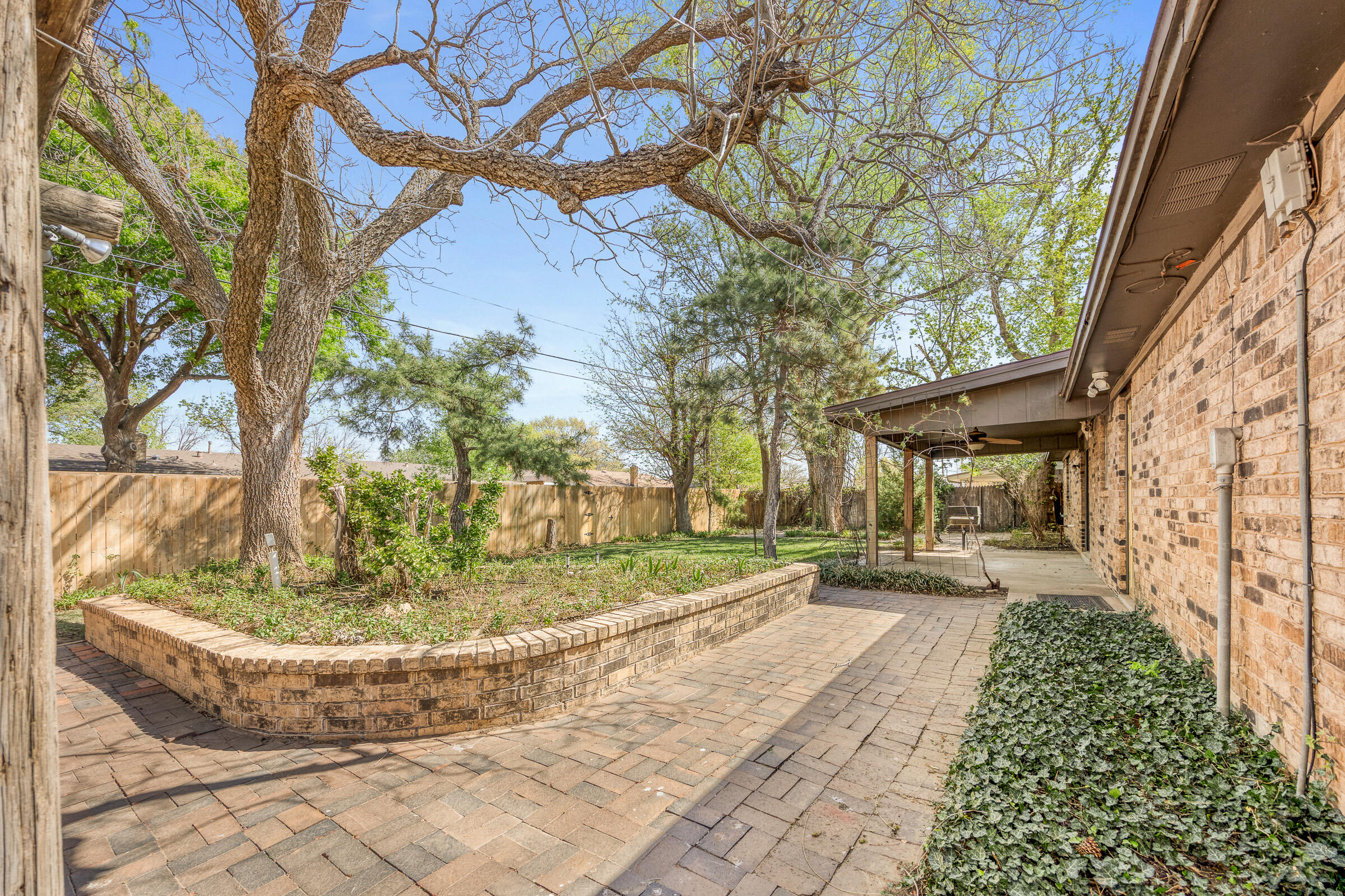 4416 62nd Street Lubbock, TX 79414 - Photo 51 of 70 a view of a yard with fountain