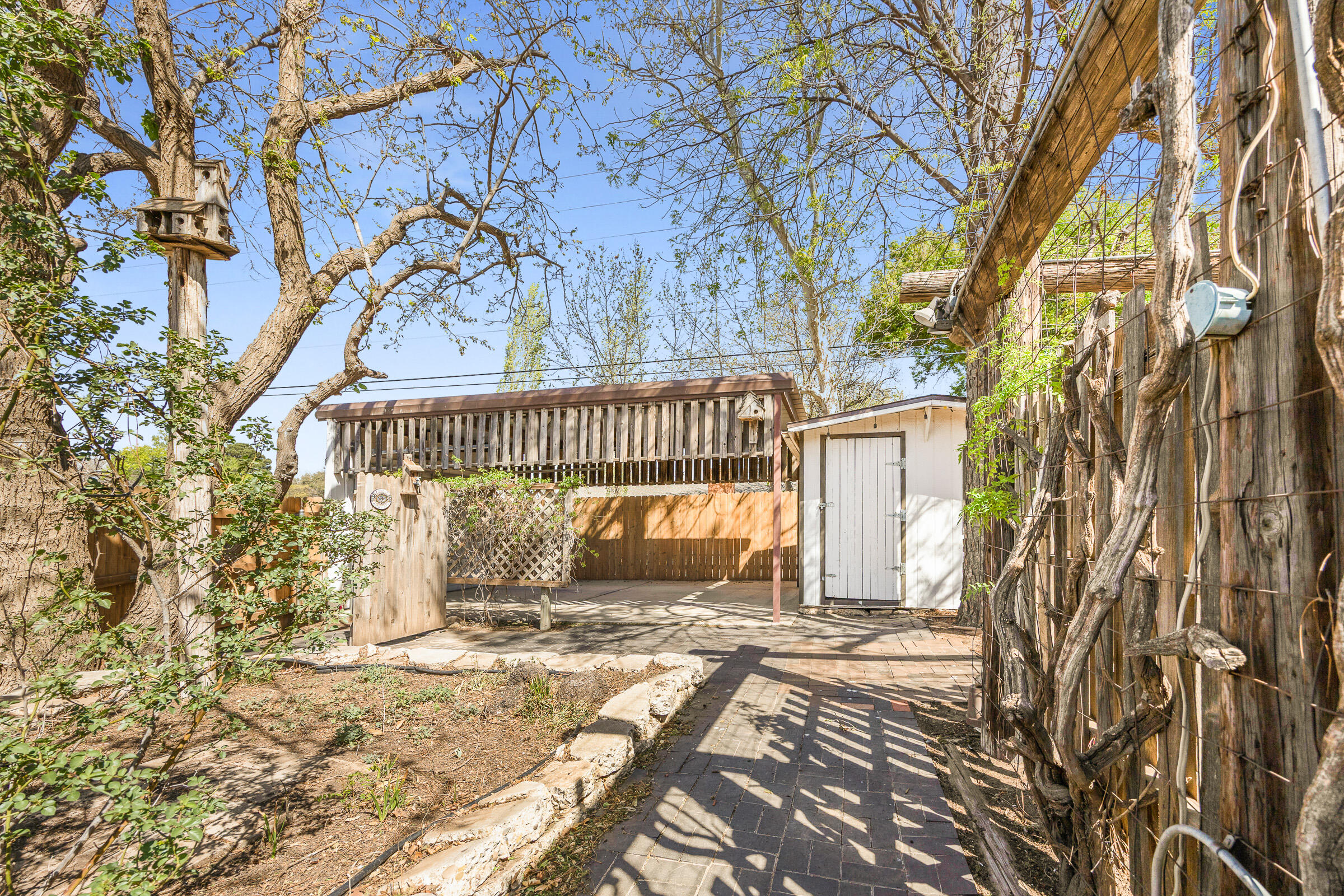 4416 62nd Street Lubbock, TX 79414 - Photo 59 of 70 a view of a bench in a yard