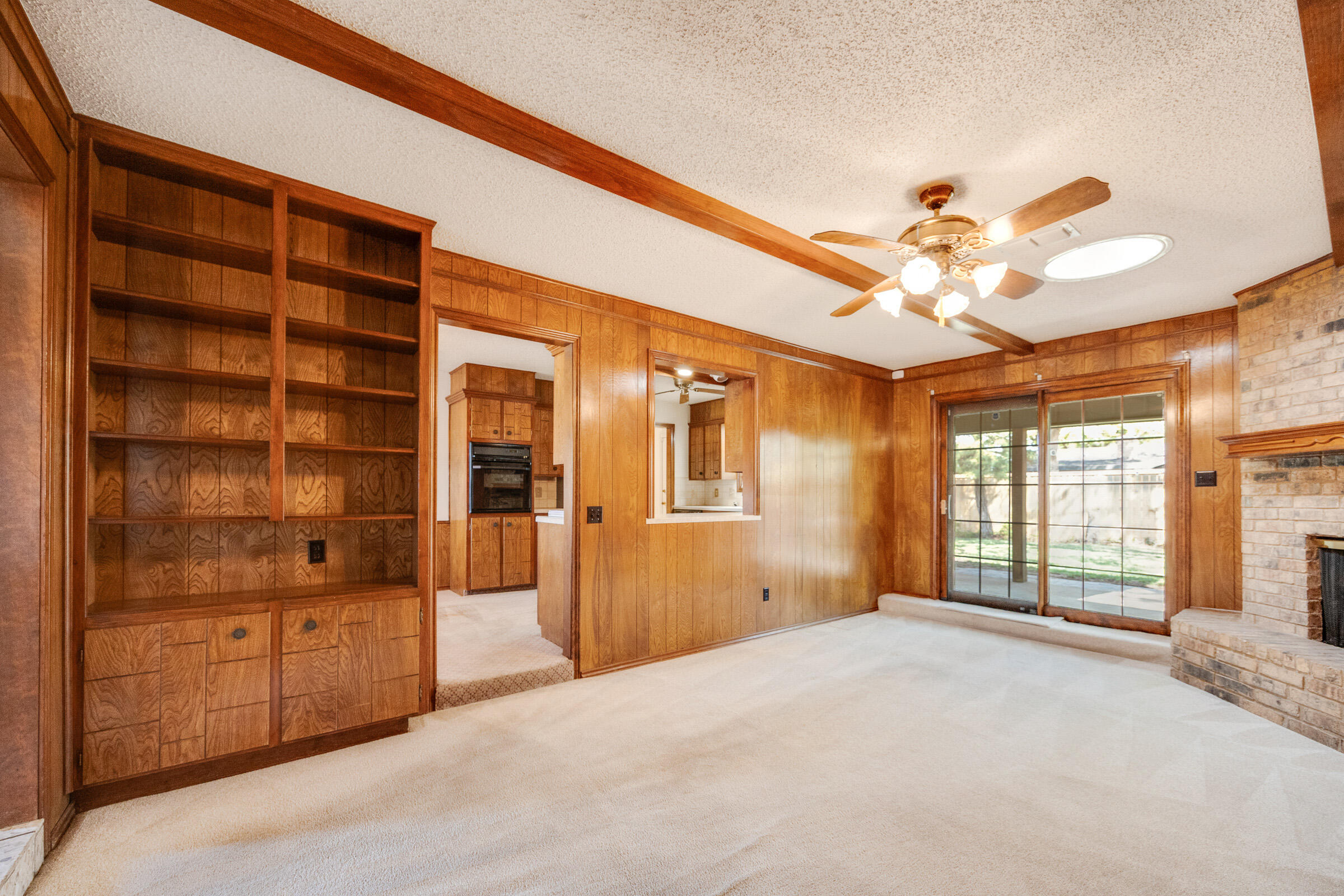 4416 62nd Street Lubbock, TX 79414 - Photo 7 of 70 a view of an empty room with a window