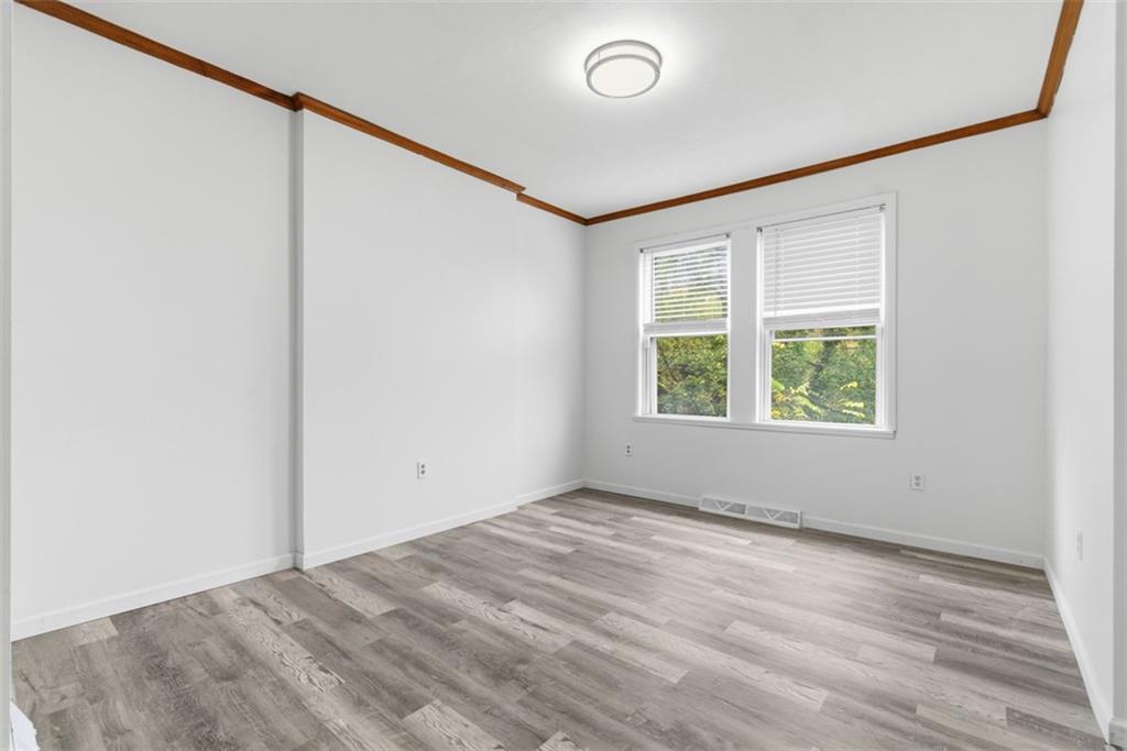 790 Highland Avenue Carnegie, PA 15106 - Photo 7 of 43 an empty room with a window