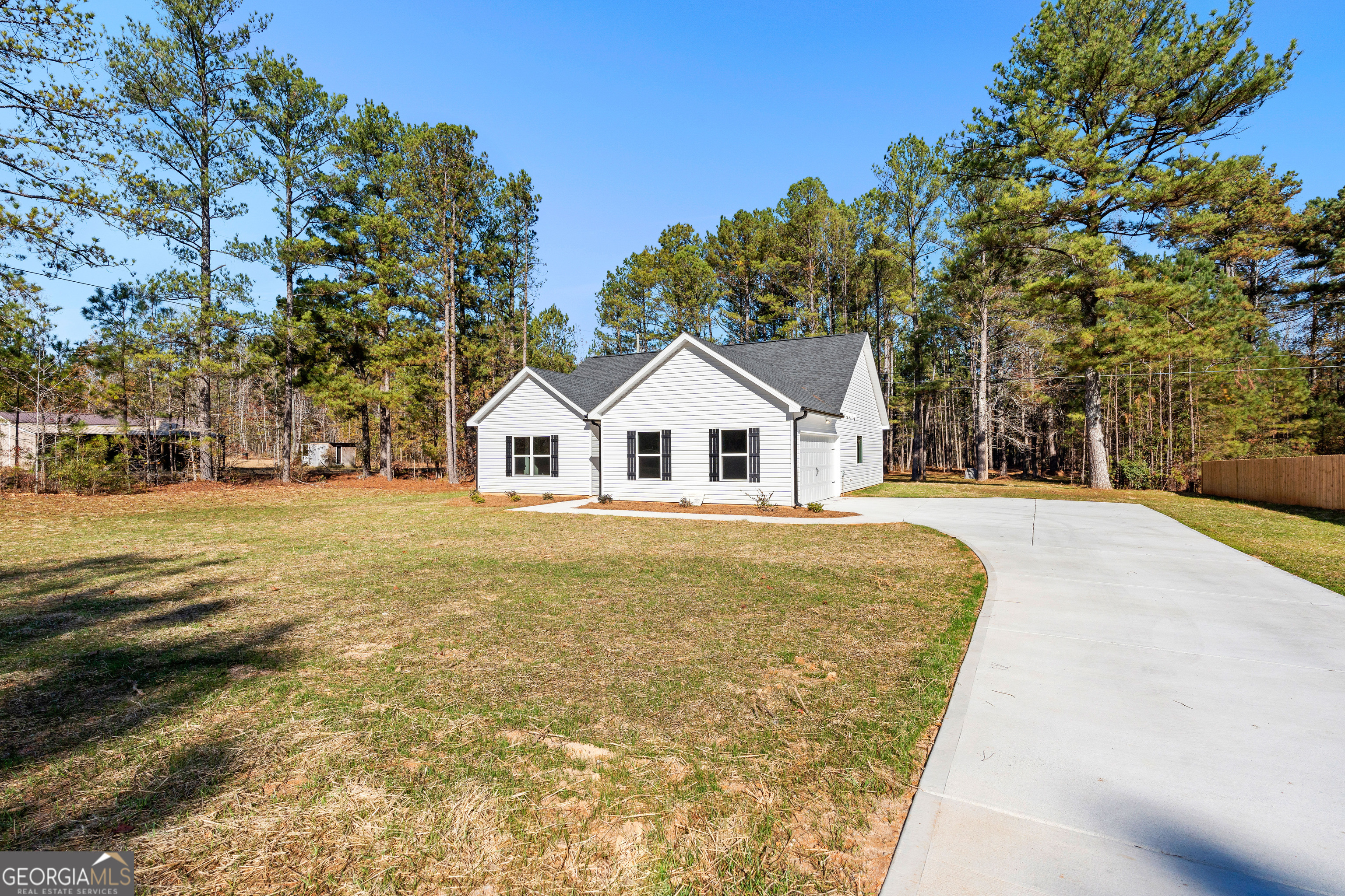 500 Todd Road Greenville, GA 30222 - Photo 2 of 47 a view of house with street and trees