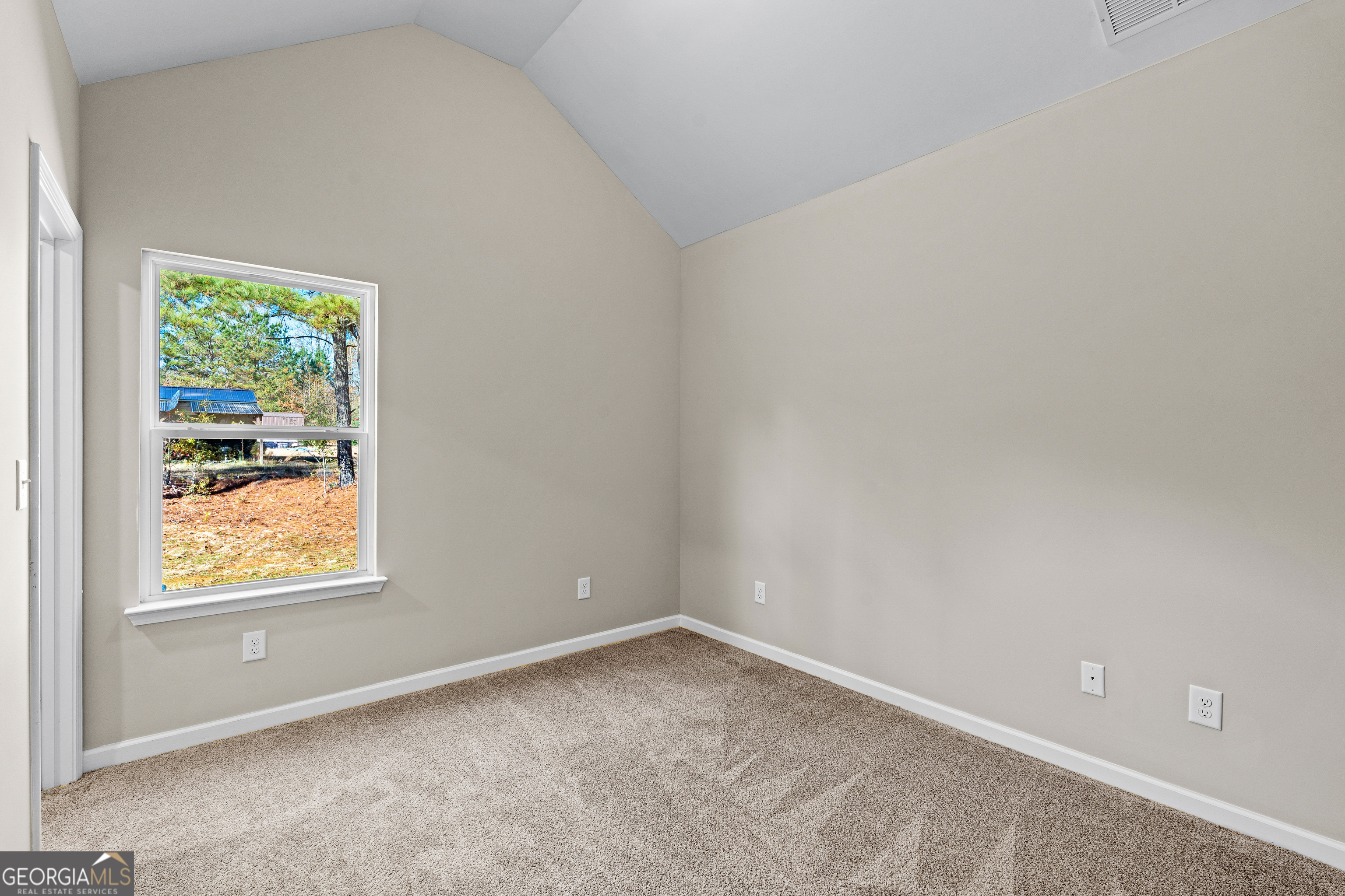 500 Todd Road Greenville, GA 30222 - Photo 23 of 47 an empty room with a window