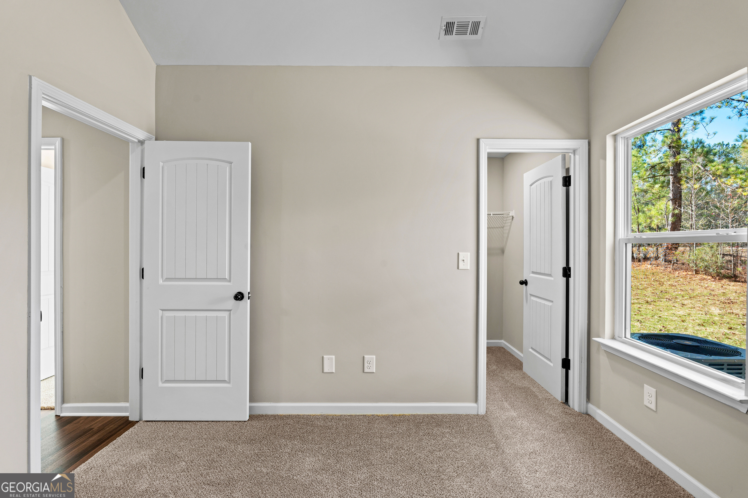 500 Todd Road Greenville, GA 30222 - Photo 25 of 47 a view of an empty room with a window