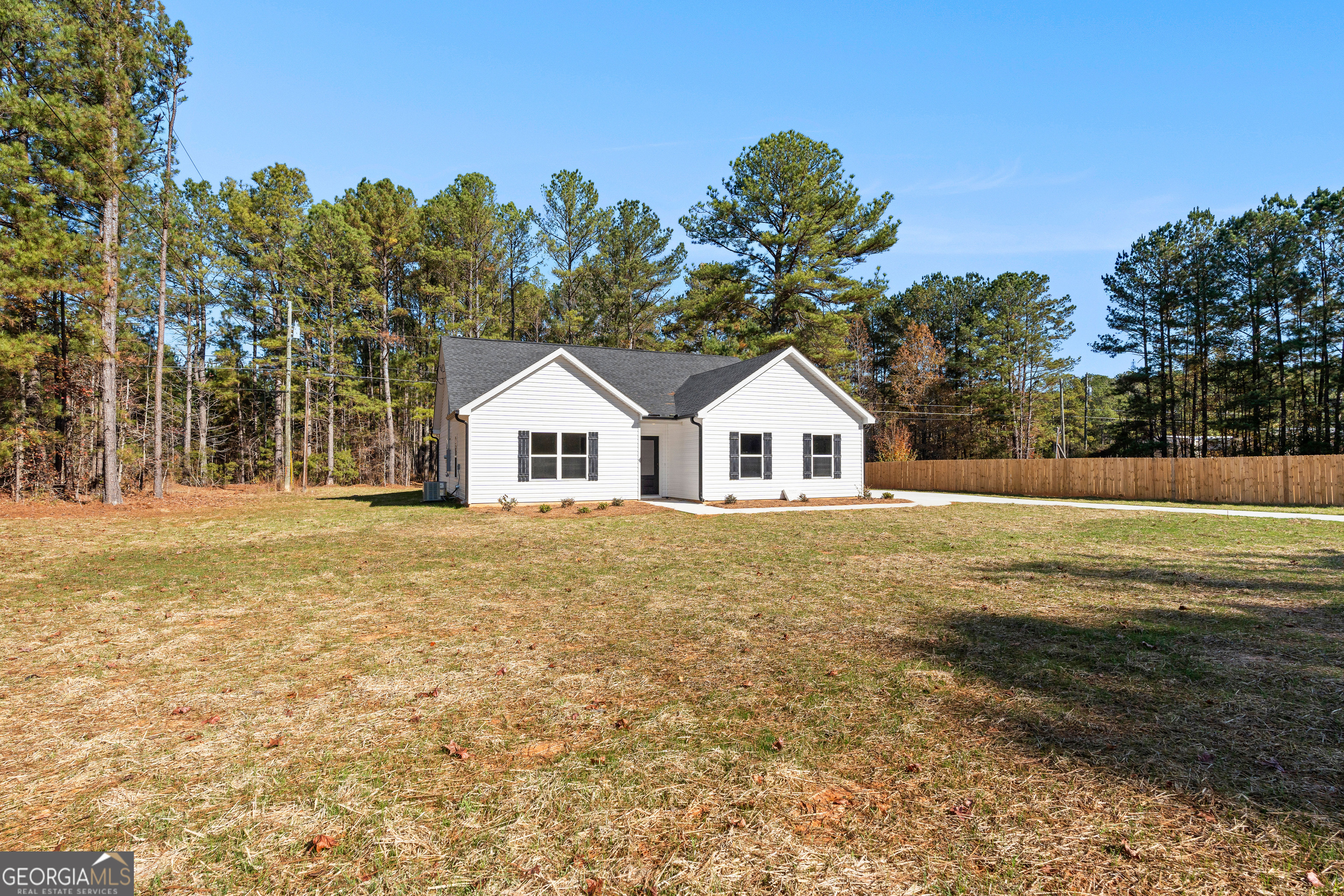 500 Todd Road Greenville, GA 30222 - Photo 3 of 47 a view of white house with a yard and outdoor space