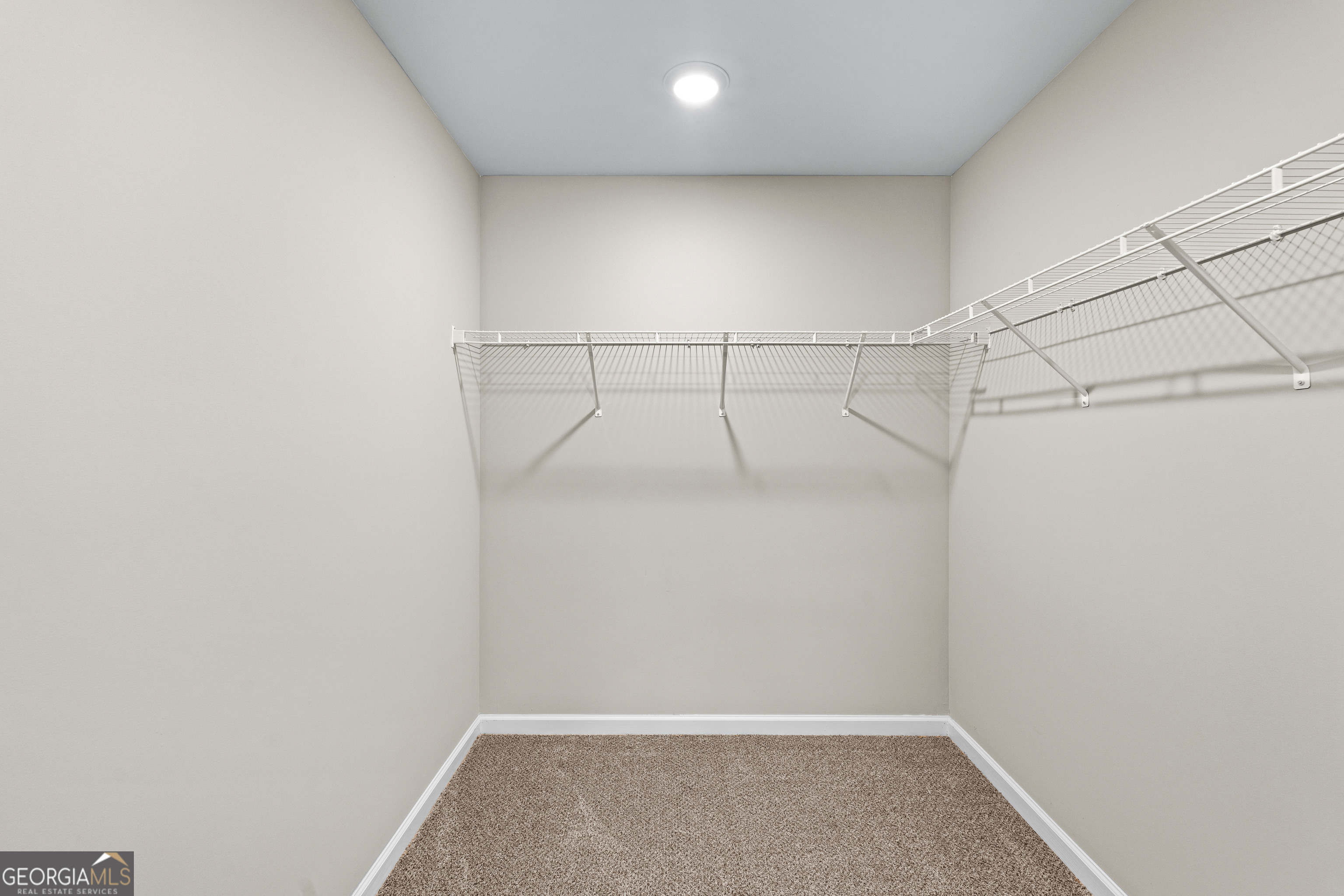 500 Todd Road Greenville, GA 30222 - Photo 37 of 47 a view of a room with racks on the wall