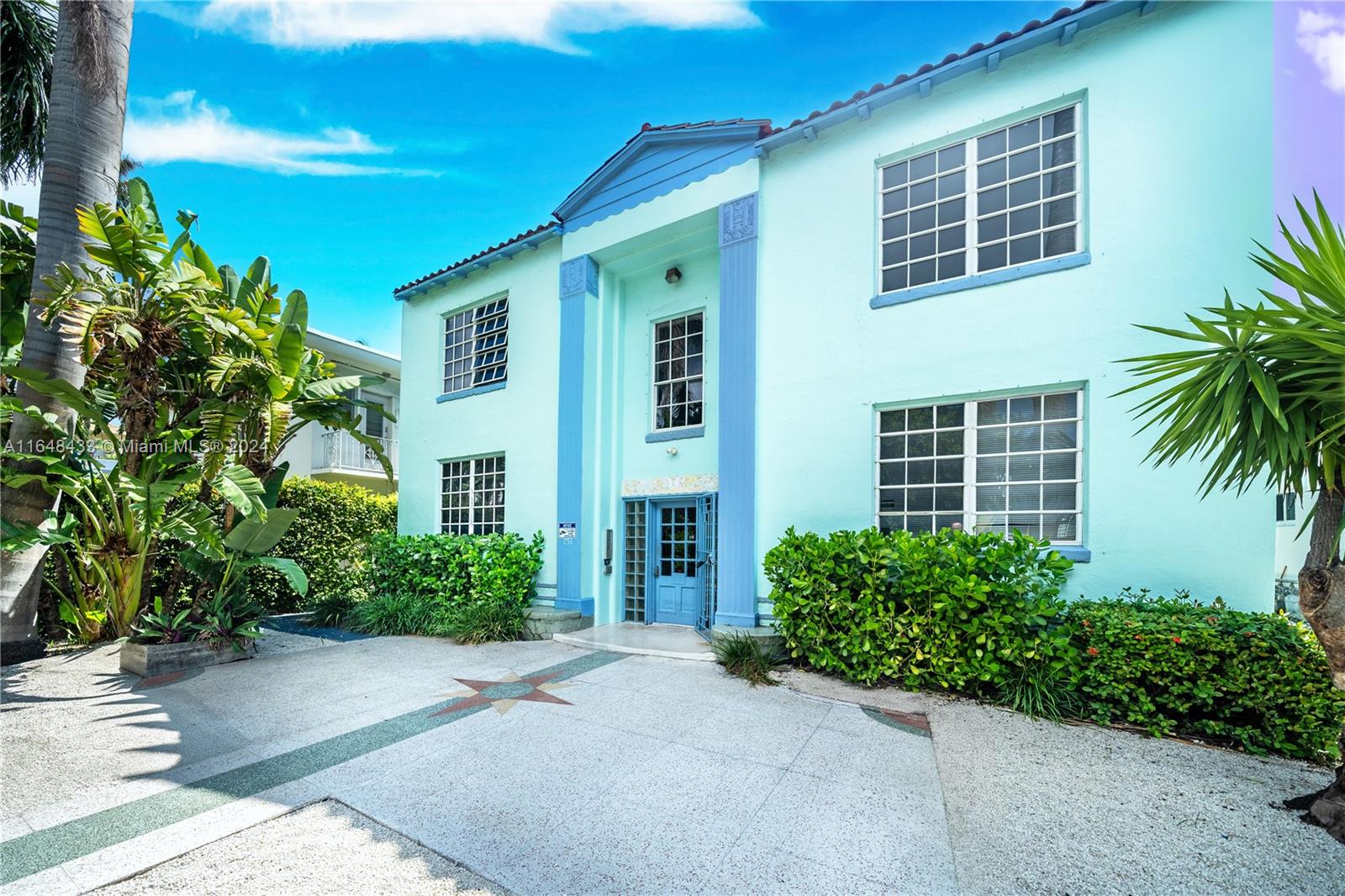 751 Euclid Avenue Miami Beach, FL 33139 - Photo 11 of 13 a front view of a house with a yard