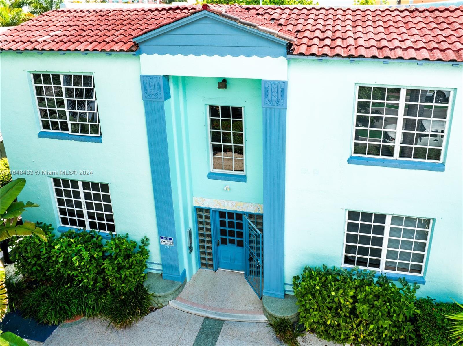 751 Euclid Avenue Miami Beach, FL 33139 - Photo 4 of 13 a front view of a house with a yard