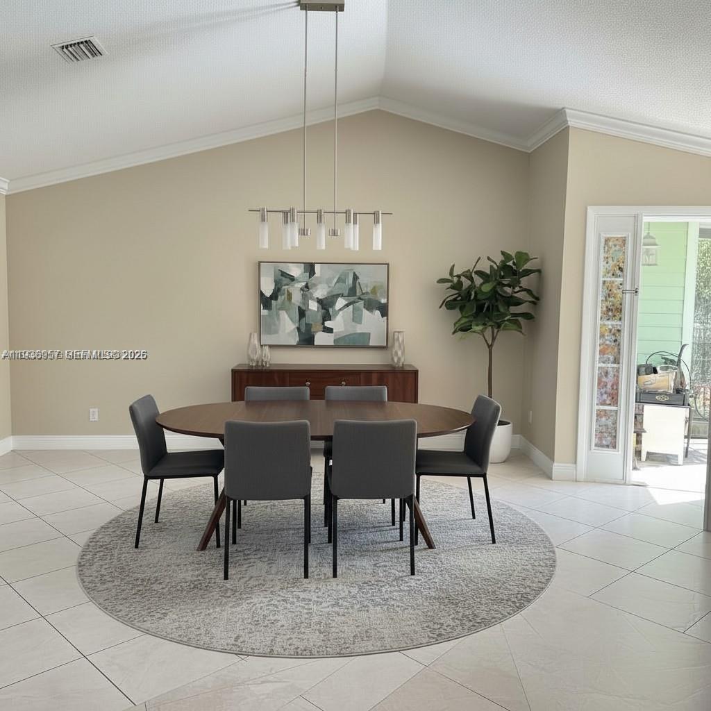 14035 Southwest 103rd Terrace Miami, FL 33186 - Photo 5 of 13 a view of a dining room with furniture